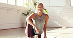 Portrait, yoga and senior woman in gym for fitness, health and rest for holistic exercise. Smile, yogi and person in studio for peace, laugh or active retirement with pilates break for wellness