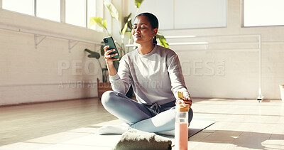 Buy stock photo Yoga, happy and woman with phone on floor for social media, online health app and workout progress. Morning, pilates studio and person on smartphone for internet, typing message and exercise website