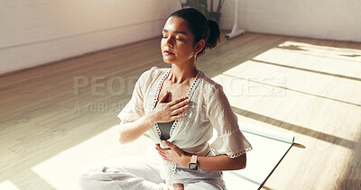 Buy stock photo Calm woman, yoga and breathing with meditation in studio for mindfulness, zen or spiritual wellness. Female person, yogi or fitness with balance for awareness, inner peace or chakra on floor or mat
