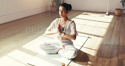 Buy stock photo Woman, yoga and namaste with meditation in studio for mindfulness, zen or spiritual wellness. Female person, calm yogi or fitness with balance for awareness, inner peace or chakra on floor or mat