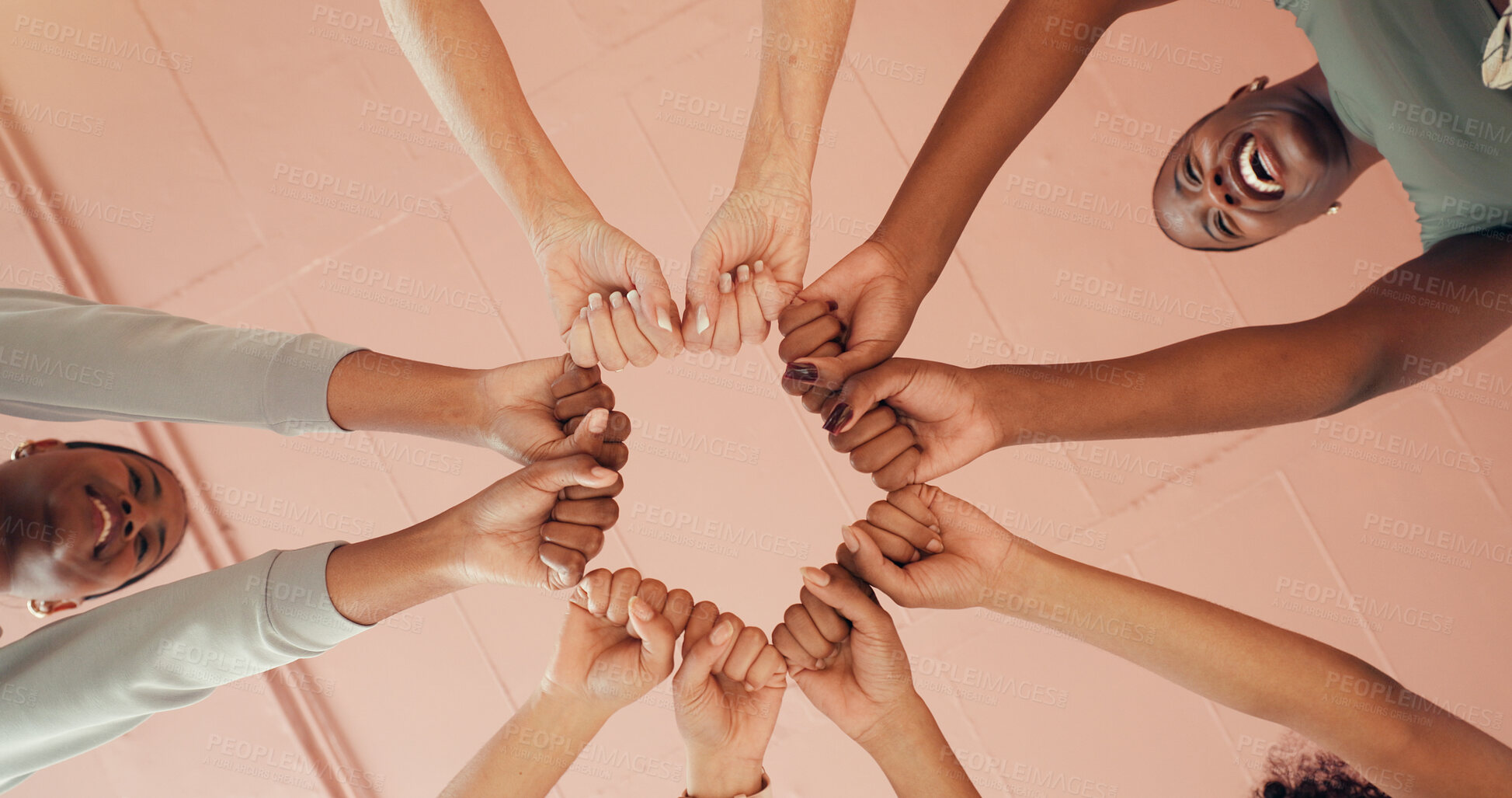 Buy stock photo Fist, fitness and solidarity with woman friends in studio together for pilates class from below. Circle, exercise and unity with hands of happy people in health club for bonding, training or wellness
