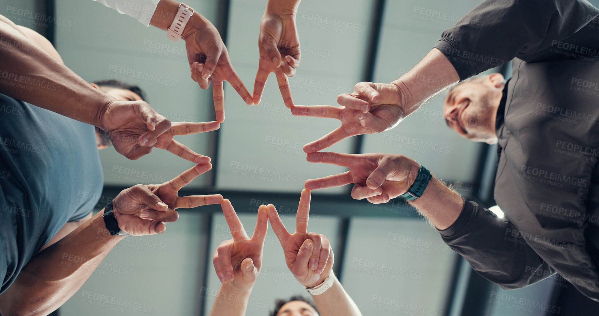 Buy stock photo Below, star and hands of people with fitness team, partner or solidarity with shape for support in gym. Group, peace sign and trust in exercise community, synergy and connection for health together