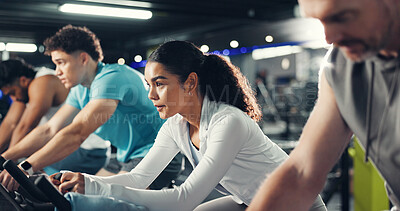 Buy stock photo Exercise bike, woman and group in gym for fitness, help or workout for health. Cycling, people and training in sport club with stationary bicycle for spin class, cardio or wellness with challenge