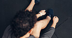 Above, athlete and tying laces with man at gym of fitness, start exercise and sports training. Male person, sneakers and getting ready for workout, practice preparation and footwear routine of health