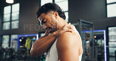 Buy stock photo Shoulder pain, exercise and man in gym, joint injury and inflammation with muscle tension. Massage, fractured and person in health center, discomfort and strain with training accident or fibromyalgia