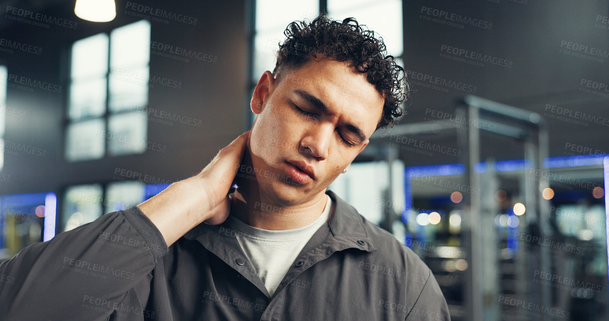 Buy stock photo Man, neck pain and fitness with injury in gym for muscle tension, stress or overworked. Male person, accident or strain with sore spine or bruise for joint inflammation, intense workout or pressure