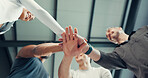 Fitness, team or group with hands together at gym for exercise support, victory or workout goals. Happy, low angle and people with huddle at sports club for training celebration or wellness community