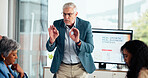 Businessman, discussion or meeting with team for presentation on business strategy in office. Mature, man or coaching group of employees in conference for company growth, project or idea in workplace
