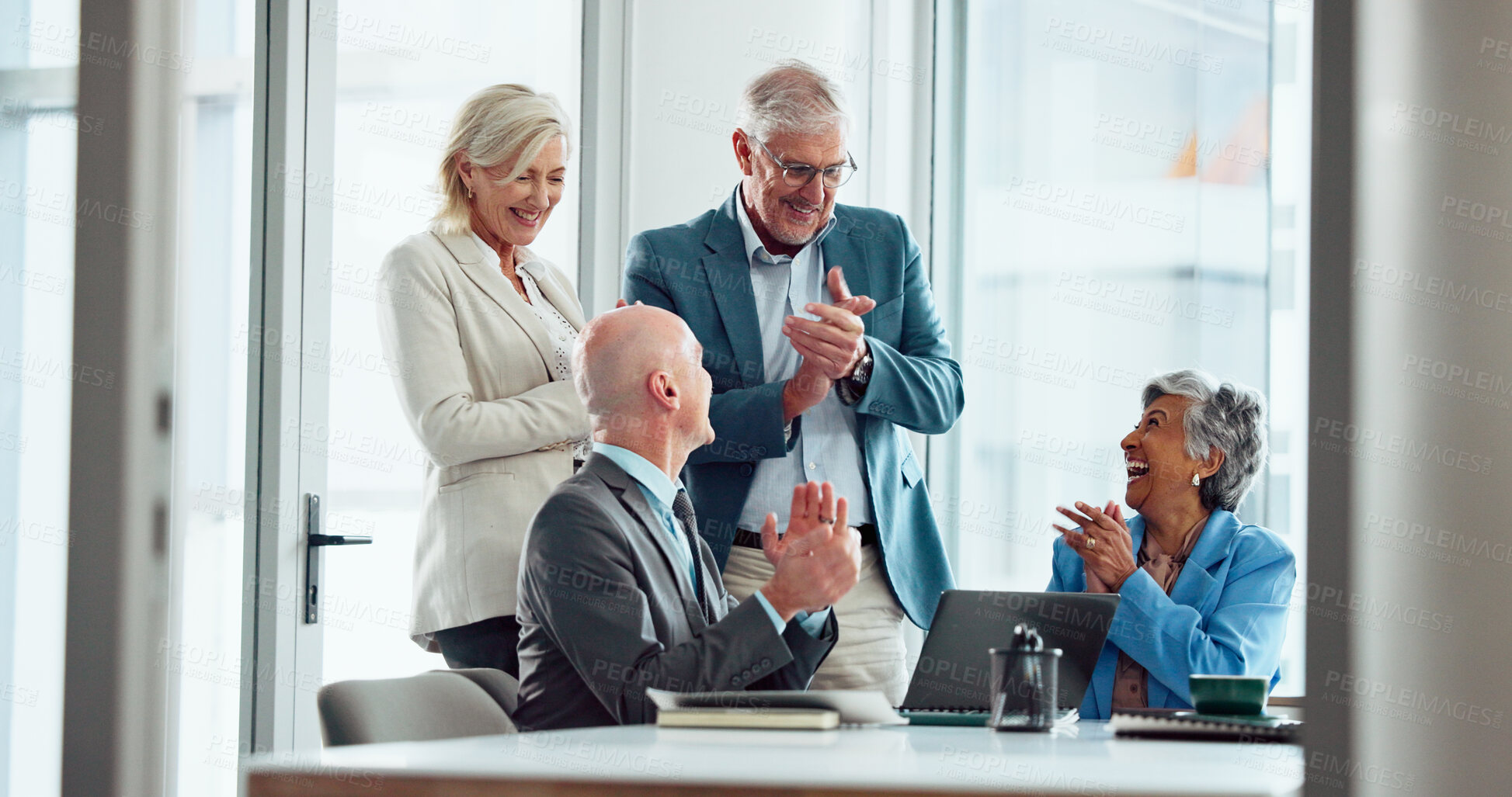 Buy stock photo Applause, group celebration or excited business people in office for success, win or financial goal. Happy team, clapping or cheering for investment, target and laughing with mature broker on laptop