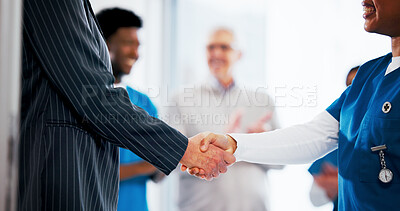 Buy stock photo Handshake, healthcare and hospital administrator with nurse in clinic for agreement or deal. Hello, meeting or welcome with manager and medical people shaking hands for contract or thank you