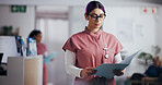 Nurse, reading and files with woman in hospital for patient history, symptoms chart or healthcare checklist. Doctor referral, treatment plan or medical report with person in clinic for test results
