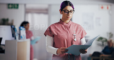Buy stock photo Nurse, reading and files with woman in hospital for patient history, symptoms chart or healthcare checklist. Doctor referral, treatment plan or medical report with person in clinic for test results