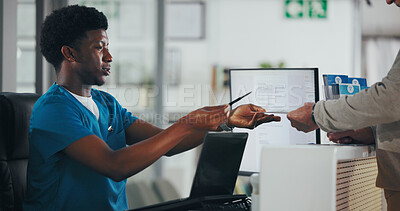 Buy stock photo Man, nurse or receptionist with paperwork for consent form or medical appointment document. Male person, clinic secretary or health assistant with pen at front desk for patient visit or schedule