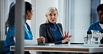 Doctors, discussion and business woman in meeting for hospital manager, surgery schedule and healthcare. Medical, planning and nurses with mature person in boardroom for clinic report and team