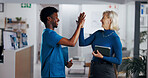 High five, nurse and woman with support in hospital, happy with success or motivation for healthcare mission. Man, mature matron and medical partnership for nursing with gesture, teamwork and tablet