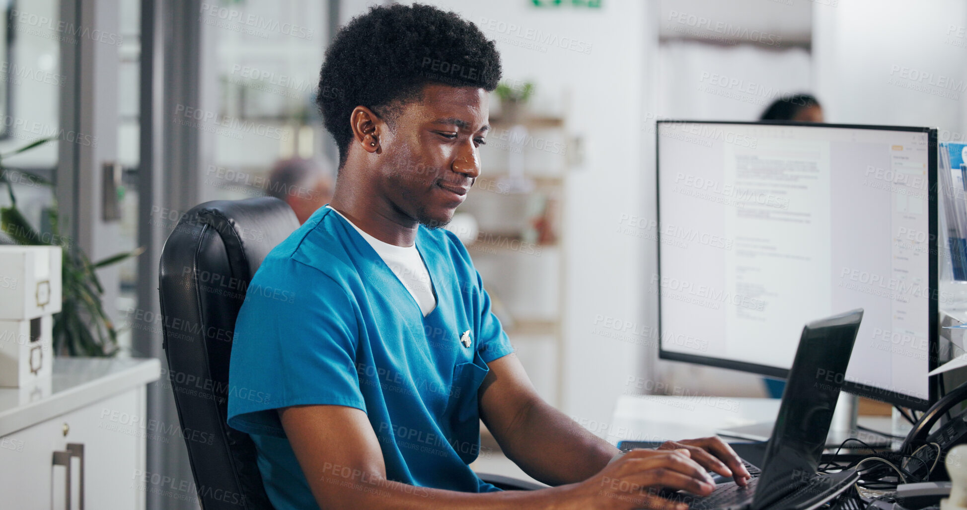 Buy stock photo Man, nurse and typing with laptop for online booking, administration or medical appointment. Male person, clinic reception and health admin with computer at front desk for planning visit or schedule