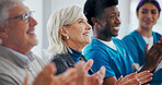 Applause, board meeting and doctors in hospital with healthcare funding opportunity. Clapping hands, discussion and medical employees with celebration for good news, achievement or goals in clinic.