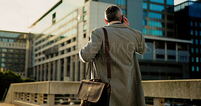 Buy stock photo Business man, phone call and back in city with lawyer travelling to court, commute or case discussion. Attorney, trial and walk on urban bridge with communication, contact and sentencing negotiation