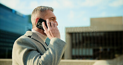Buy stock photo Businessman, discussion and listening with phone call in city for conversation or negotiation. Mature, man or talking with mobile smartphone for business communication, deal or chat in an urban town