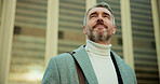 Business, thinking and man in city, calm and urban town with morning commute, travel and choice. Mature person, outdoor and employee with decision, future and ideas with opportunity and New York