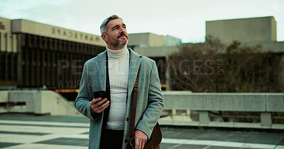 Buy stock photo Phone, thinking and business man in city for travel, reflection or vision with urban planner. Outdoor, mobile or mature employee with thoughts, decision or insight on work commute with town developer