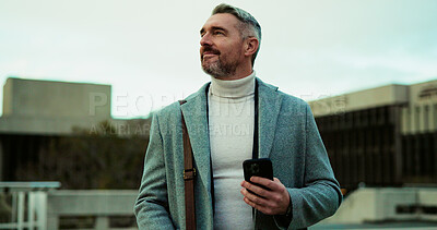Buy stock photo Thinking, employee and man with smartphone, city and planning for property development or commuting. Reflection, urban planner and mature person with mobile in morning, vision and ambition for career