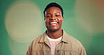 Happy, black man and portrait with fashion in studio for christmas on a green background. Male person, African model or holiday smile with positive attitude for festive vibe, style or outfit on bokeh