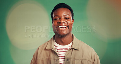 Buy stock photo Happy, black man and portrait with laugh in studio for funny joke or comedy on a green background. Male person, African model or smile with positive attitude or expression for humor or style on bokeh