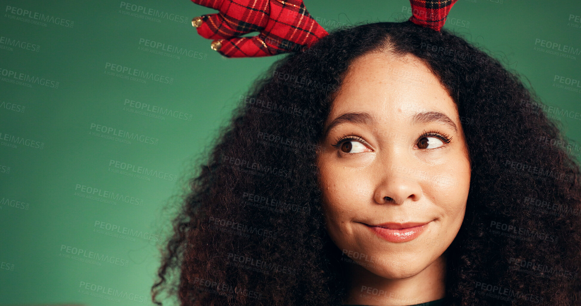 Buy stock photo Christmas, thinking and idea with woman in studio for decision, holiday season and gift planning. Festive tradition, reflection and mockup space with person on green background for inspiration