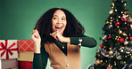 Christmas, excited and woman dance in studio for celebration at festive event on green background. Xmas, happiness and girl moving with rhythm for energy, holiday tradition or laugh with party music