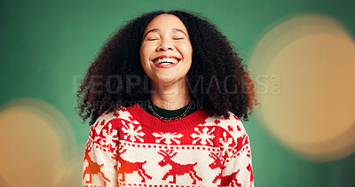 Buy stock photo Smile, woman and laughing in studio for Christmas season, celebration and festive tradition. Happy, African person and bokeh with xmas jersey, funny joke and december holiday on green background