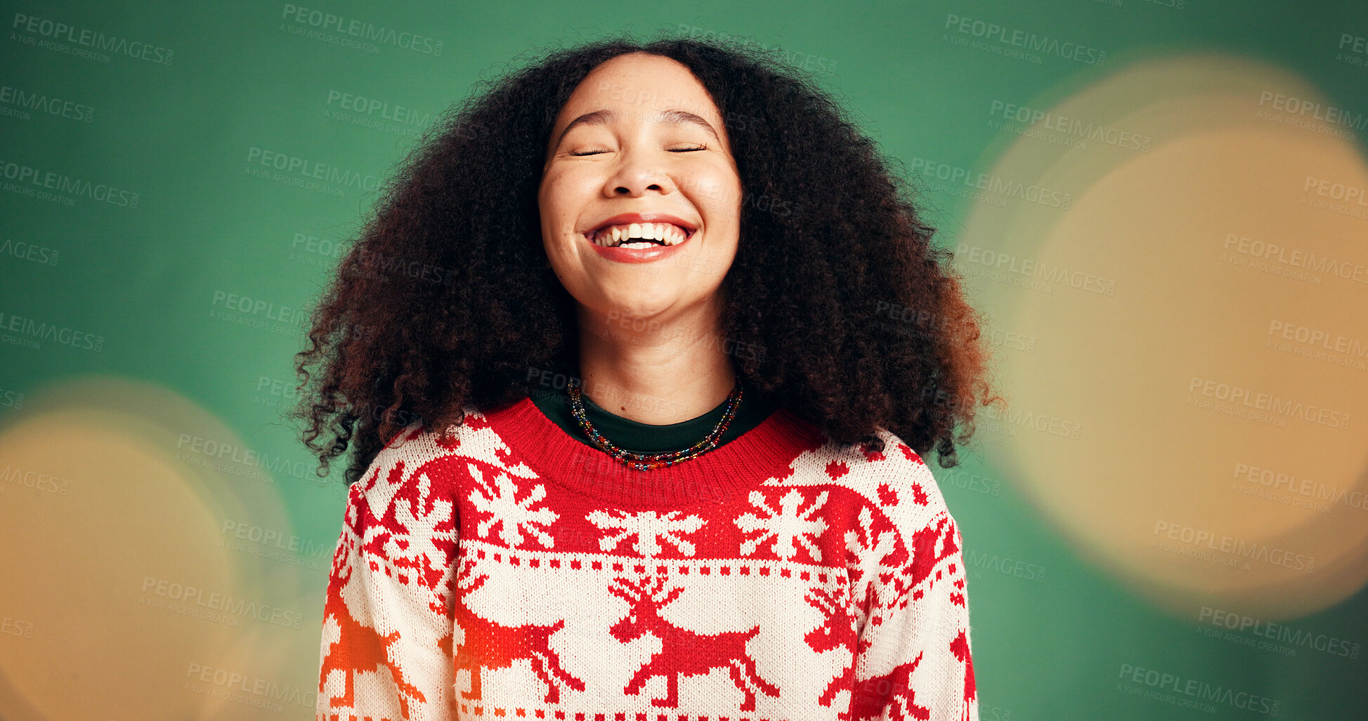 Buy stock photo Smile, woman and laughing in studio for Christmas season, celebration and festive tradition. Happy, African person and bokeh with xmas jersey, funny joke and december holiday on green background