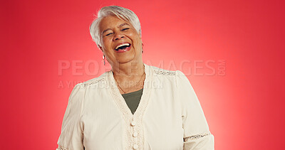 Buy stock photo Happy, laugh and senior woman in studio with funny joke, humor reaction and positive attitude. Mockup space, retirement and mature person with comic, goofy emotion and silly on red background