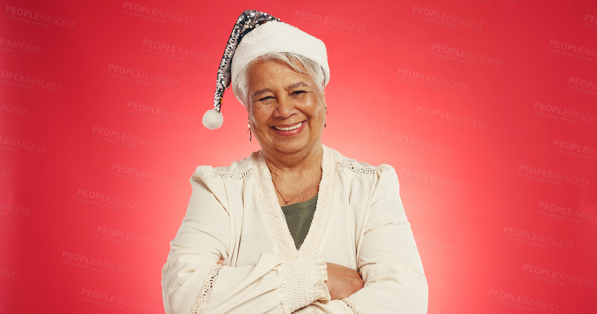 Buy stock photo Christmas, happy and portrait of mature woman in studio for holiday, vacation and festive season. Mockup space, hat and person for tradition, xmas celebration and December event on red background