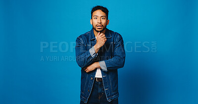 Buy stock photo Portrait, surprise and man in studio, wow and sales announcement on blue background. Space, shocked and person with facial expression, omg and discount deal with news, notification and promotion