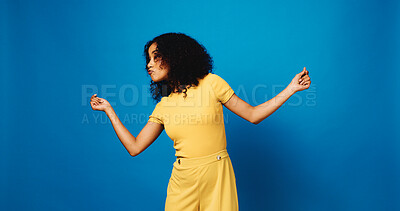 Buy stock photo Studio, woman and dance for celebration with success, lottery win and achievement on blue background. Funny, model and moving with rhythm for goal, good news and bonus promotion with mockup space