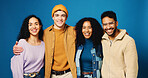 Hug, students and portrait of friends in studio for college application, enrollment and scholarship. Happy, blue background and people with pride for university, school and education opportunity
