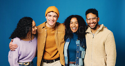 Buy stock photo Hug, students and portrait of people in studio for college application, enrollment and scholarship. Happy, blue background and friends with pride for university, school and education opportunity