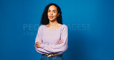 Buy stock photo Happy, woman and portrait of teacher in studio with confidence for high school education career. Smile, female person or educator from Colombia with pride for job development by blue background space