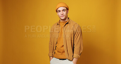 Buy stock photo Clothes, portrait and serious with fashion designer man on studio background to model trendy outfit. Aesthetic, retail and small business with confident design employee isolated on space for style