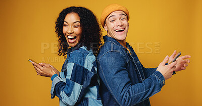 Buy stock photo Portrait, funny and people in studio, smartphone and laughing on yellow background. Happy friends, man and woman with smile, cellphone and comedy video with humor, joke and support with digital app