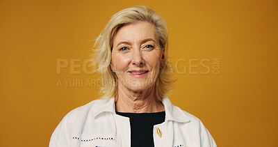 Buy stock photo Smile, mature and portrait of business woman in studio for fashion designer, entrepreneur or pride. Stylist, about us and trendy with person on orange background for creative director on mockup space