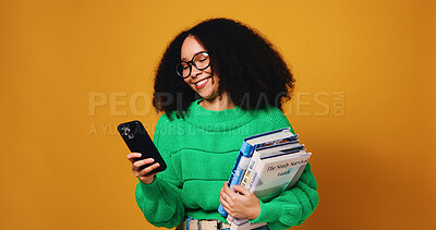 Buy stock photo Happy woman, student and phone with books for learning or education on a studio background. Female person, academic or learner with mobile smartphone for university scholarship or app on mockup space