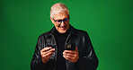 Senior, happy man or phone with credit card in studio for online shopping on a green background. Elderly, male person or model with smile on mobile smartphone for ecommerce, remote banking or payment