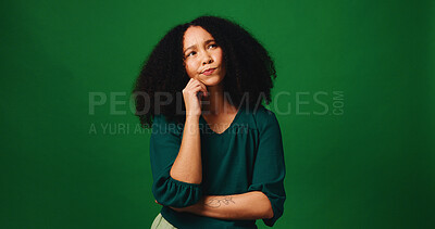 Buy stock photo Thinking, solution and businesswoman in studio with doubt, question or ideas for planning career. Decision, option and professional female person with mockup, nostalgia or choice by green background.