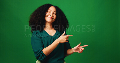 Buy stock photo Happy woman, portrait or pointing with fashion in studio for marketing on a green background. Female person, model or advertising with smile, gesture or selection for choice or option on mockup space
