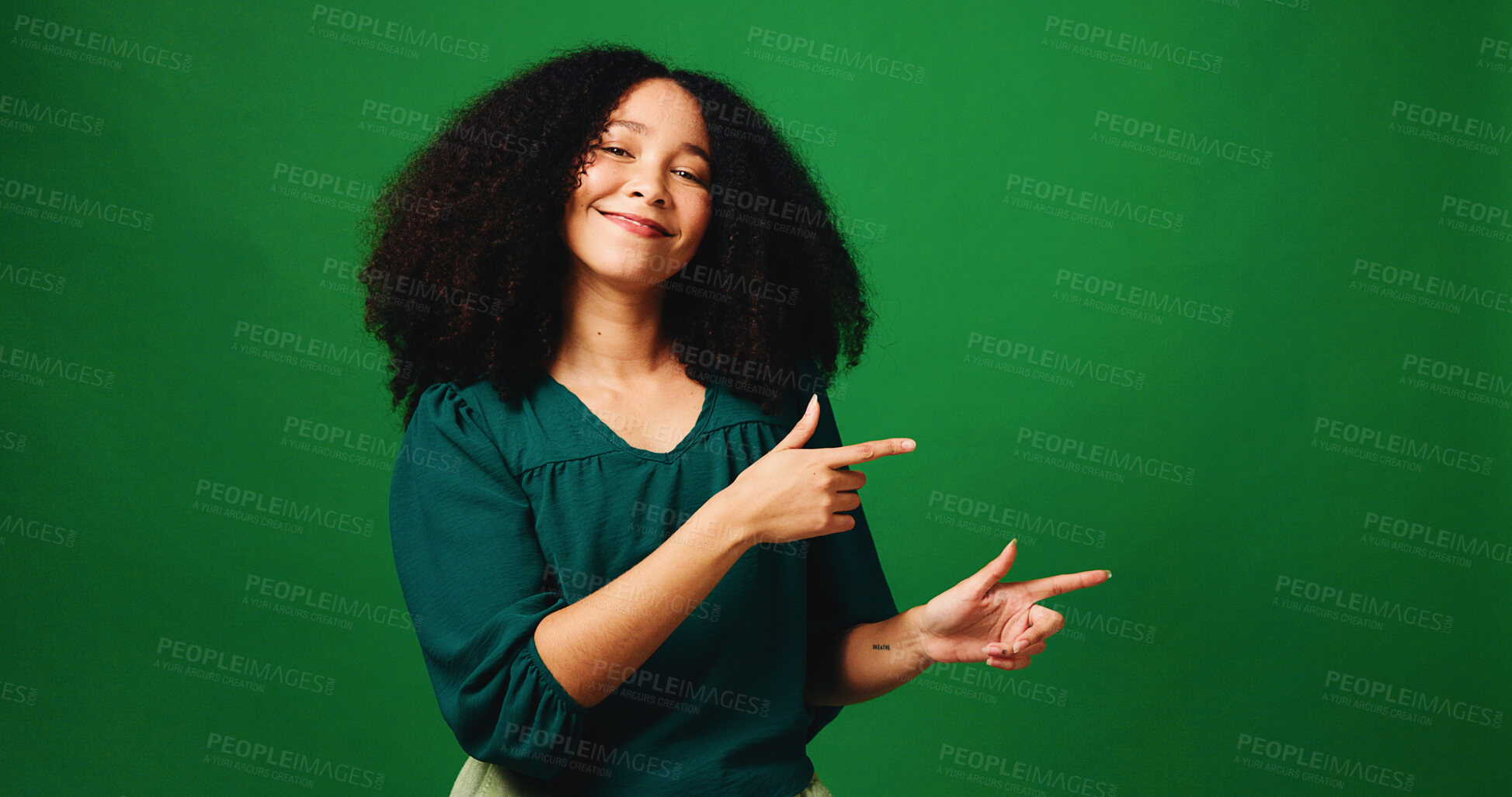 Buy stock photo Happy woman, portrait or pointing with fashion in studio for marketing on a green background. Female person, model or advertising with smile, gesture or selection for choice or option on mockup space