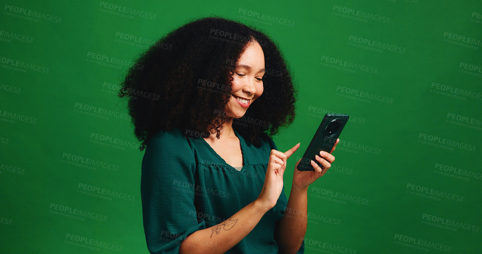 Buy stock photo Studio, message and woman with smartphone, happy and communication with contact on mobile and space. Read, social media and person with smile for digital chat, green background and texting with tech