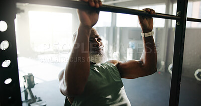 Buy stock photo Fitness, man and pull up exercise at gym for shoulder strength, muscle mass and bodybuilding. Bodybuilder, mature black person and power training on workout bar for core development and performance