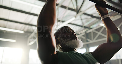 Buy stock photo Fitness, man and pull up workout at gym for shoulder strength, muscle mass and biceps routine. Bodybuilder, mature black person and power training on exercise bar for core development or bodybuilding